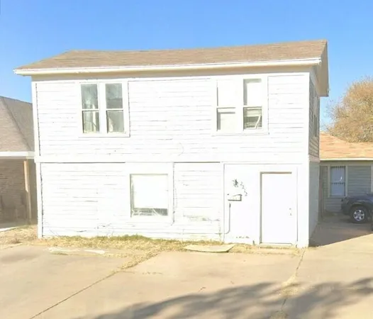 a view of a house with a outdoor space