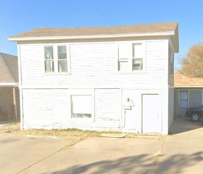 a view of a house with a outdoor space