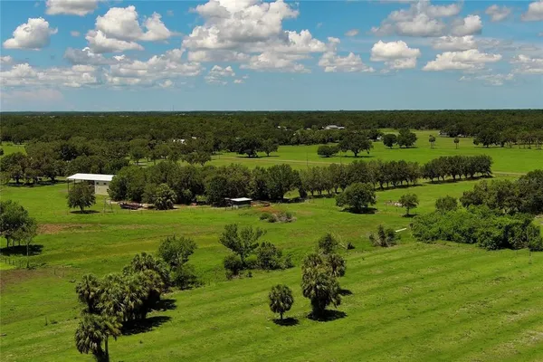 a view of a golf course with a lake