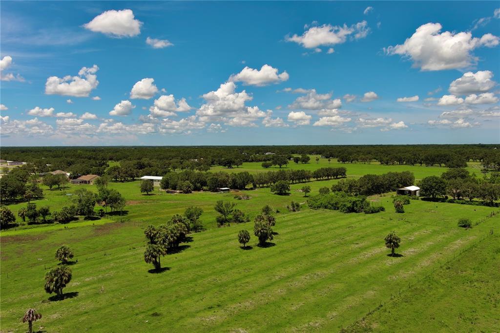 15820 County Road 675 Parrish, FL 34219 - Photo 4 of 14 a view of a golf course with a swimming pool