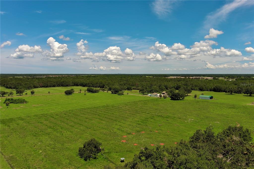 15820 County Road 675 Parrish, FL 34219 - Photo 5 of 14 a view of a lake with a big yard