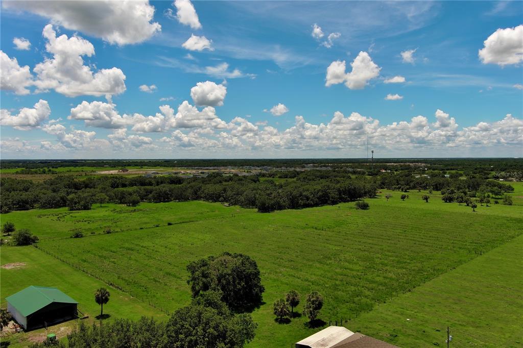 15820 County Road 675 Parrish, FL 34219 - Photo 10 of 14 a view of a golf course with a big yard
