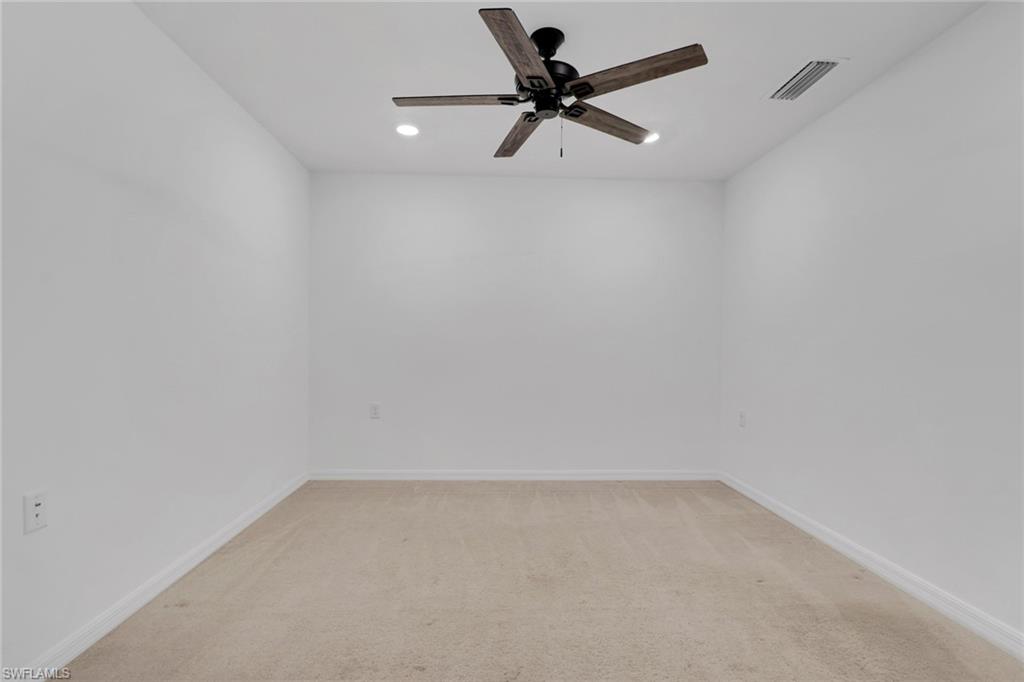 6047 Ellerston Way, Unit 2125 Ave Maria, FL 34142 - Photo 13 of 41 Den located off living room
