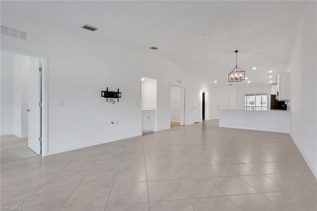 6047 Ellerston Way, Unit 2125 Ave Maria, FL 34142 - Photo 16 of 41 Spacious living room and dining room