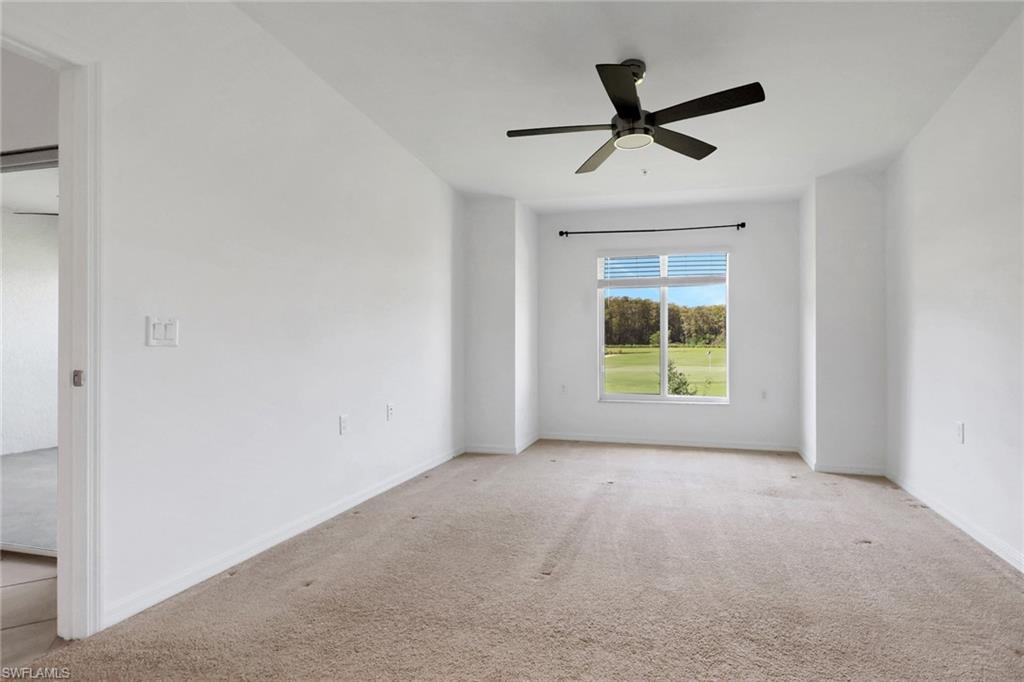 6047 Ellerston Way, Unit 2125 Ave Maria, FL 34142 - Photo 19 of 41 Main Bedroom with golf and lake views
