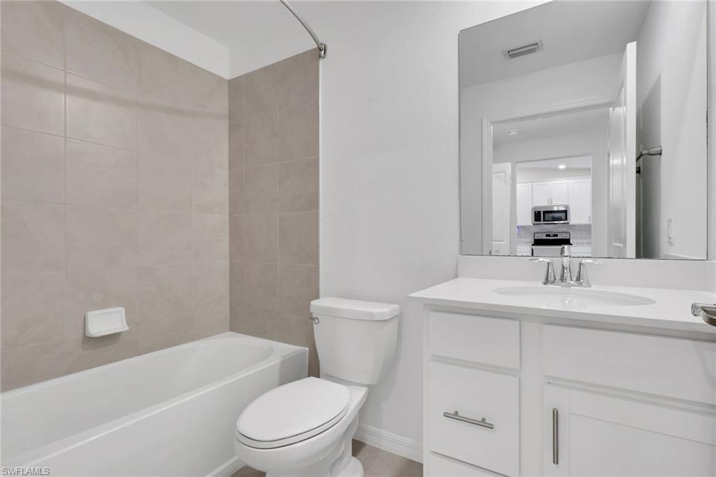 6047 Ellerston Way, Unit 2125 Ave Maria, FL 34142 - Photo 23 of 41 2nd Bathroom located in hall next to 2nd bedroom
