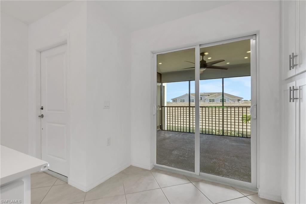 6047 Ellerston Way, Unit 2125 Ave Maria, FL 34142 - Photo 7 of 41 Screened front entry and patio space