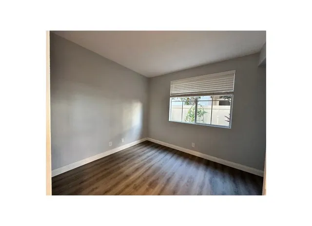 a bathroom with a sink a mirror and a toilet