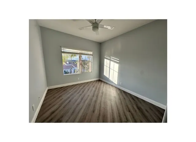 a bathroom with a sink double vanity and a mirror