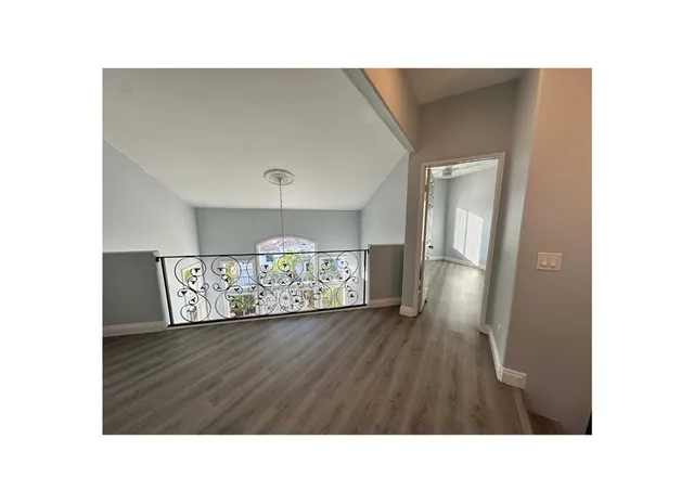 a black and white photo of a bench