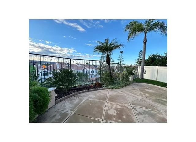 a bathroom with a sink double vanity granite and a mirror