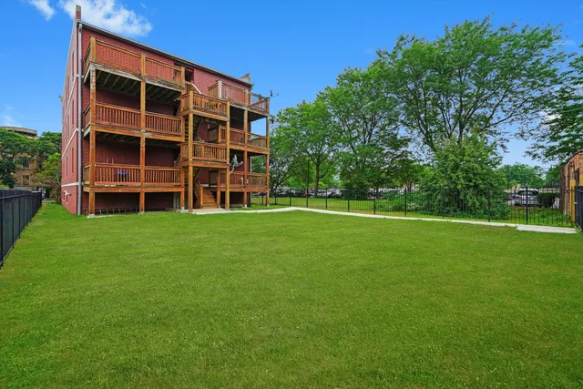 a view of building with yard