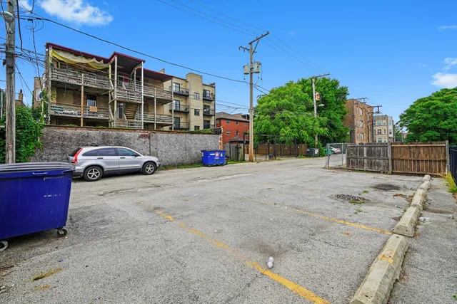 a cars parked in front of a building