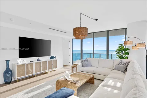 a bedroom with a large bed and a table