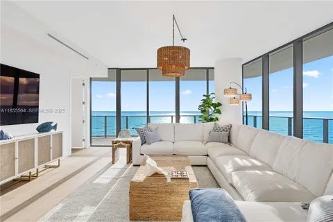 a bedroom with a bed and a table