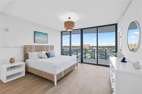 a view of a swimming pool with chairs