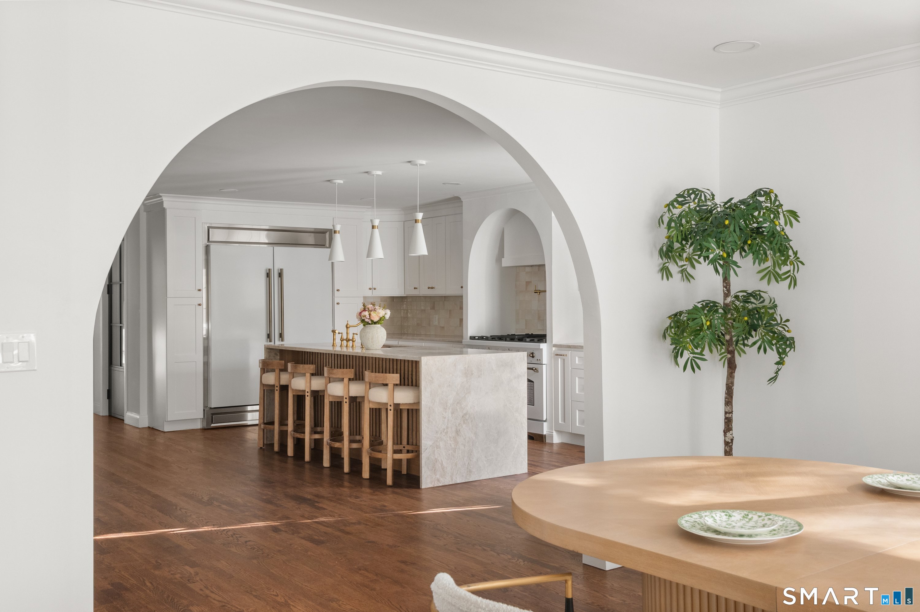 913 Ridgefield Road Wilton, CT 06897 - Photo 15 of 40 a view of kitchen with furniture and a potted plant