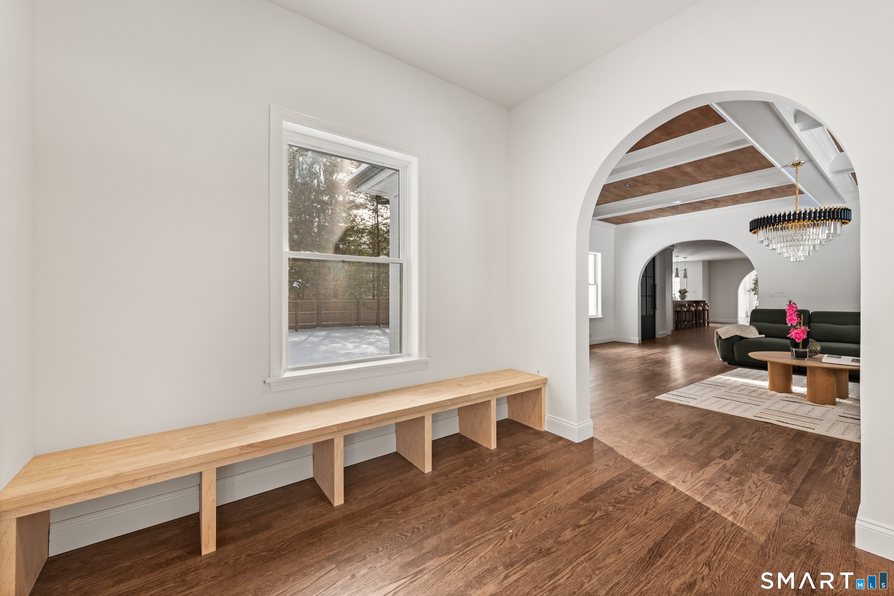 913 Ridgefield Road Wilton, CT 06897 - Photo 25 of 40 a living room with furniture and a window