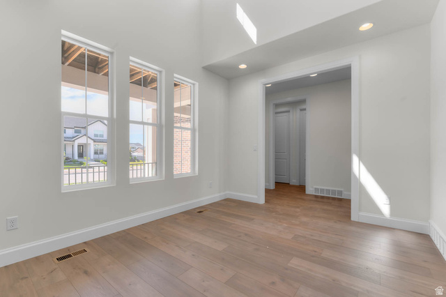 11749 South Halls Crk Road Draper, UT 84020 - Photo 10 of 21 Unfurnished room with light wood-style flooring and recessed lighting