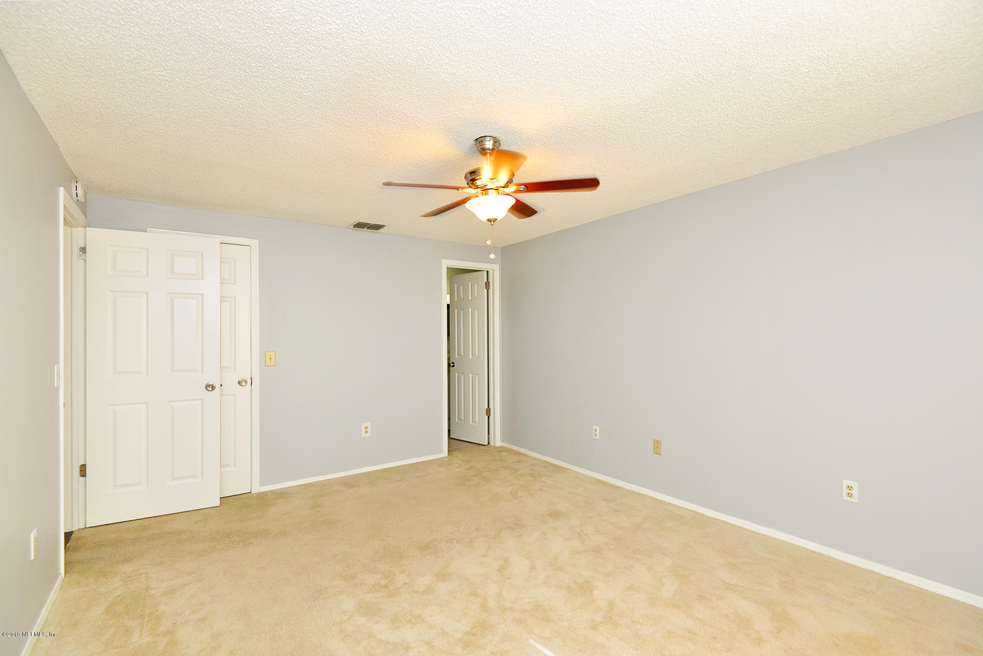 2545 Spring Lake Road West Jacksonville, FL 32210 - Photo 12 of 21 a view of entryway and hall with a chandelier fan
