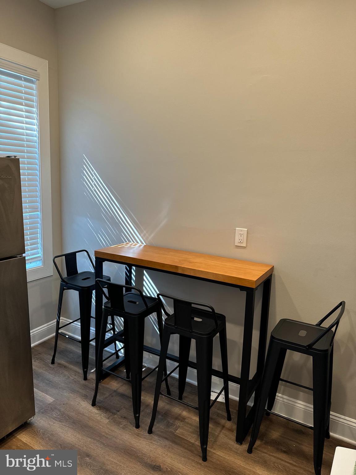 1628 North Calvert Street Baltimore, MD 21202 - Photo 41 of 63 a view of dinning table and chairs in a room