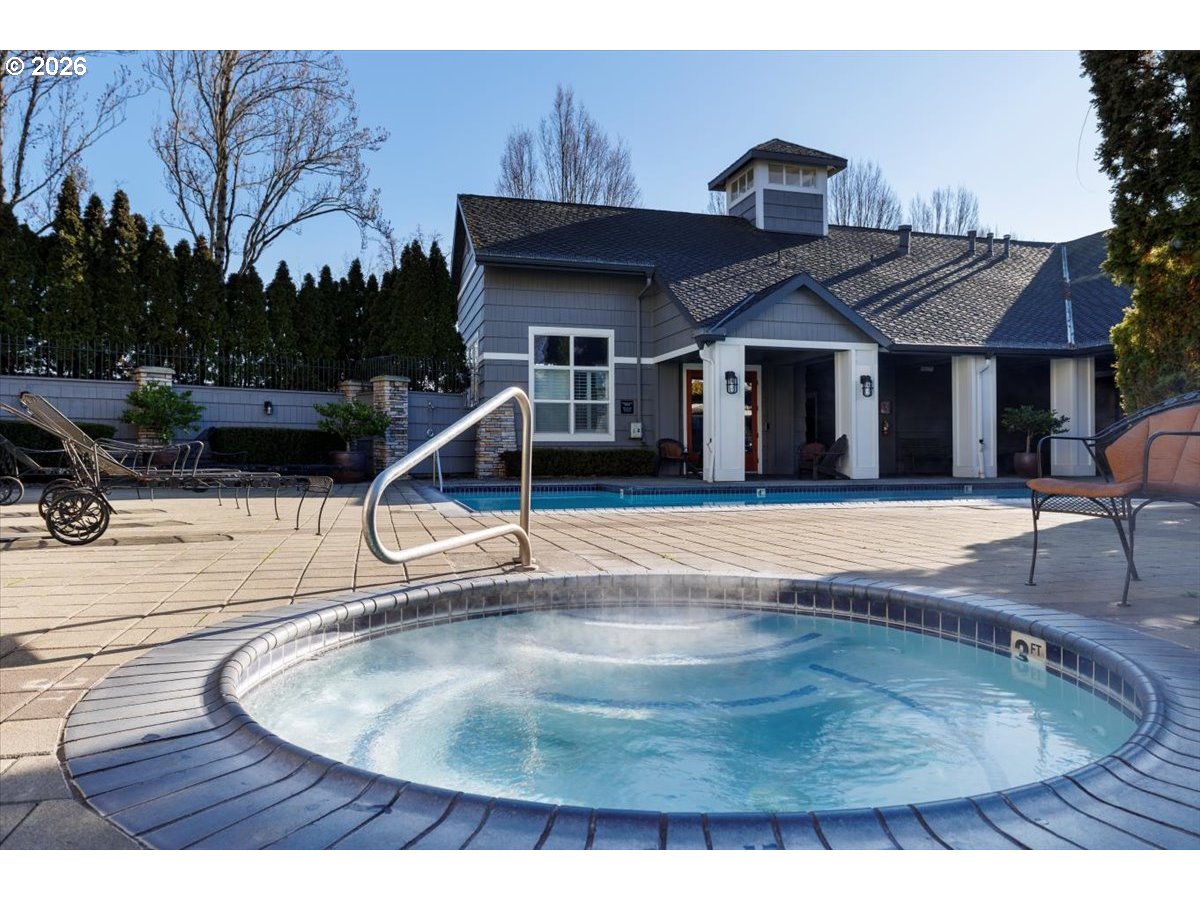 723 Southeast Fairwinds Loop, Unit BLDG H Vancouver, WA 98661 - Photo 29 of 34 a view of a house with backyard