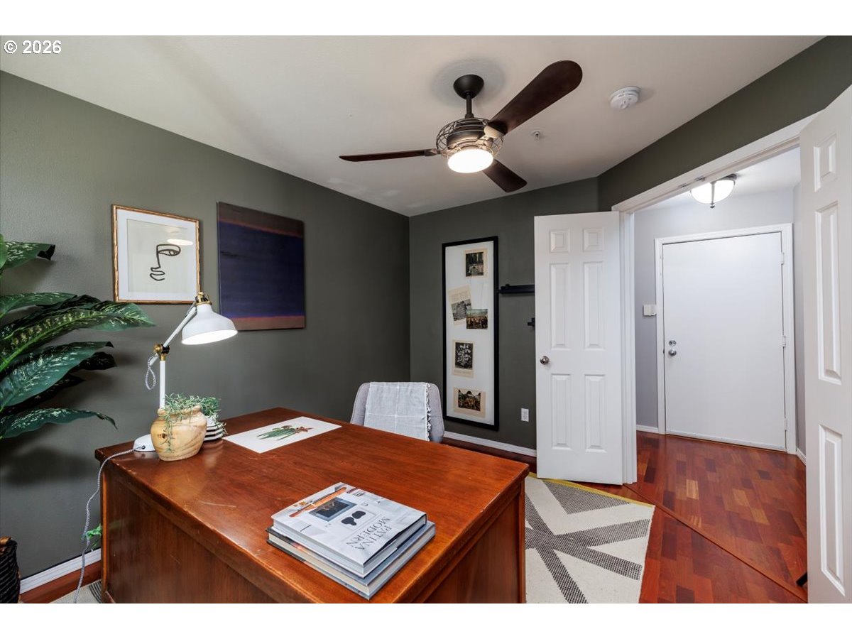 723 Southeast Fairwinds Loop, Unit BLDG H Vancouver, WA 98661 - Photo 7 of 34 a living room with furniture and wooden floor