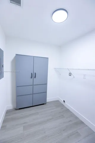 a view of a room with an empty space