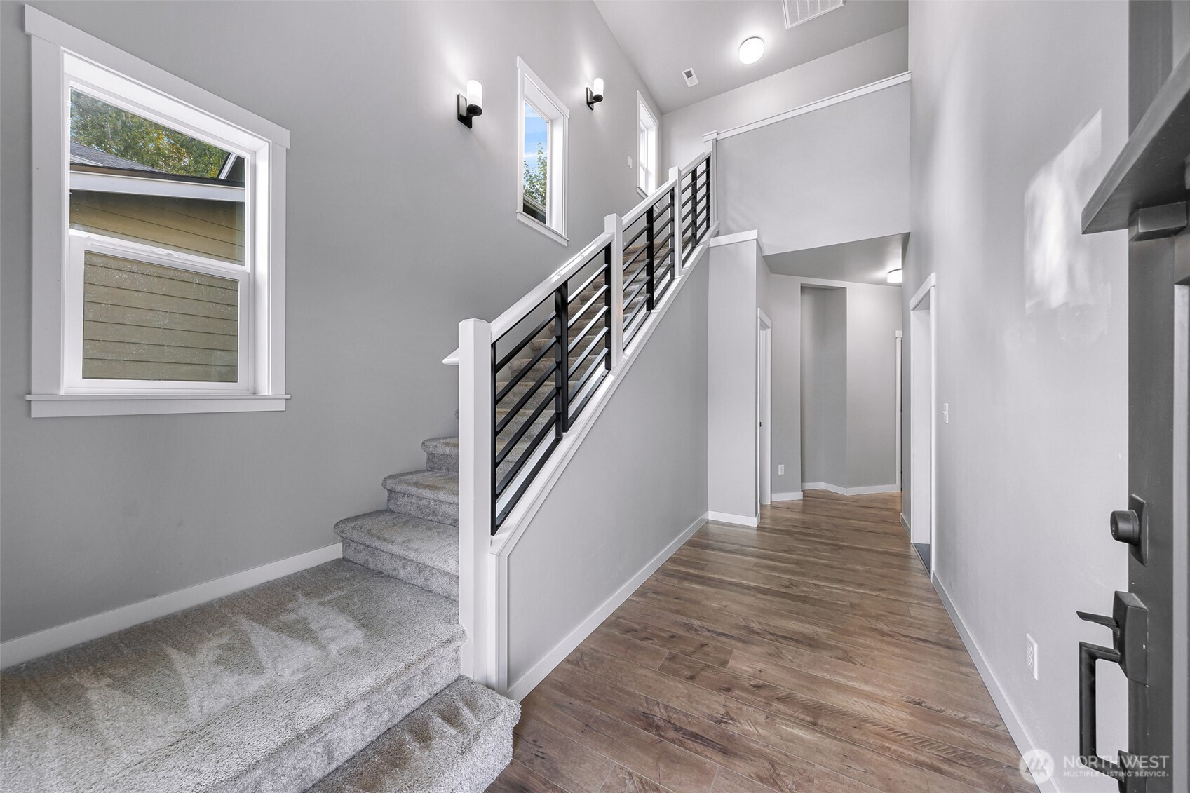 2058 Andre Court Ferndale, WA 98248 - Photo 14 of 39 a view of entryway and hall with wooden floor