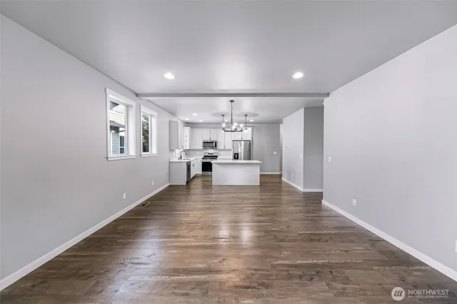 a view of kitchen with wooden floor