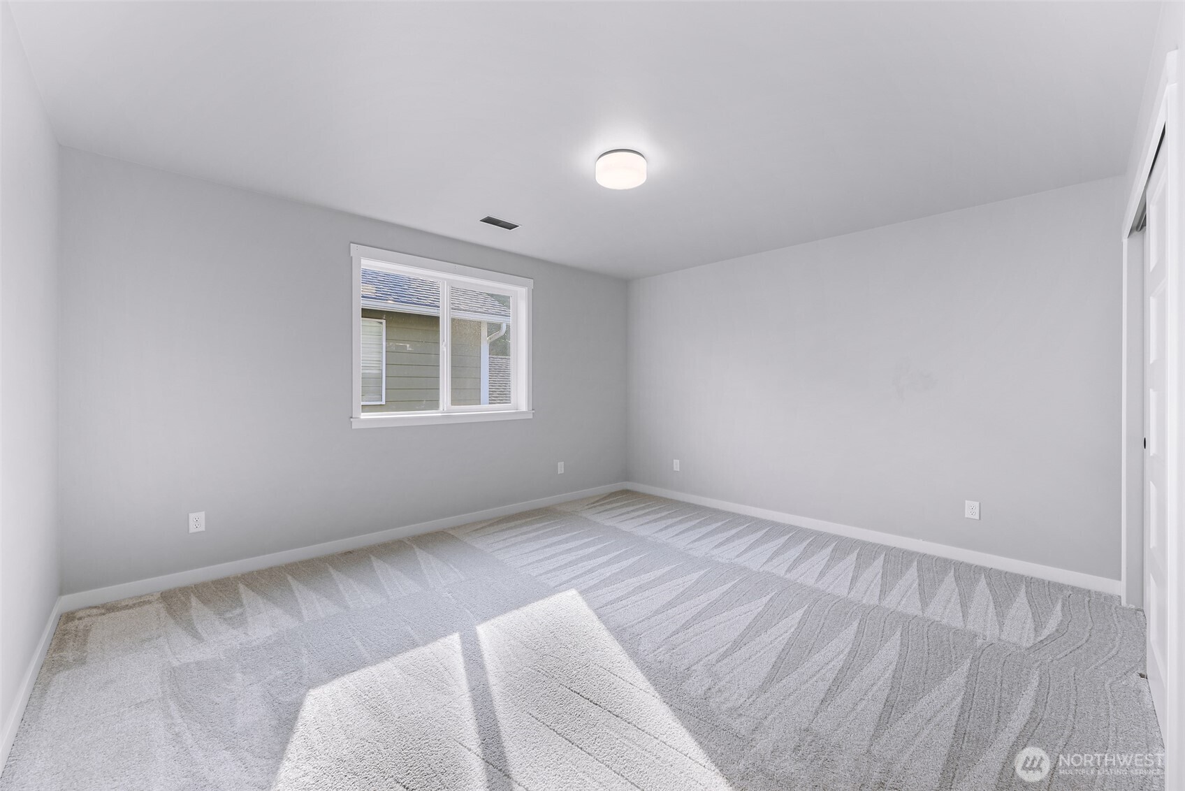 2058 Andre Court Ferndale, WA 98248 - Photo 32 of 39 a view of room with window and a ceiling fan