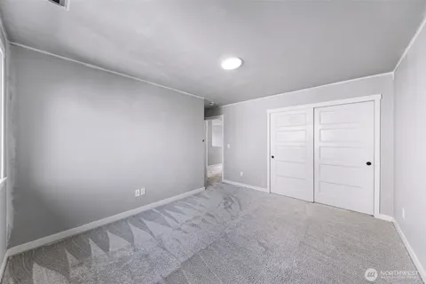 a view of a deck with a yard