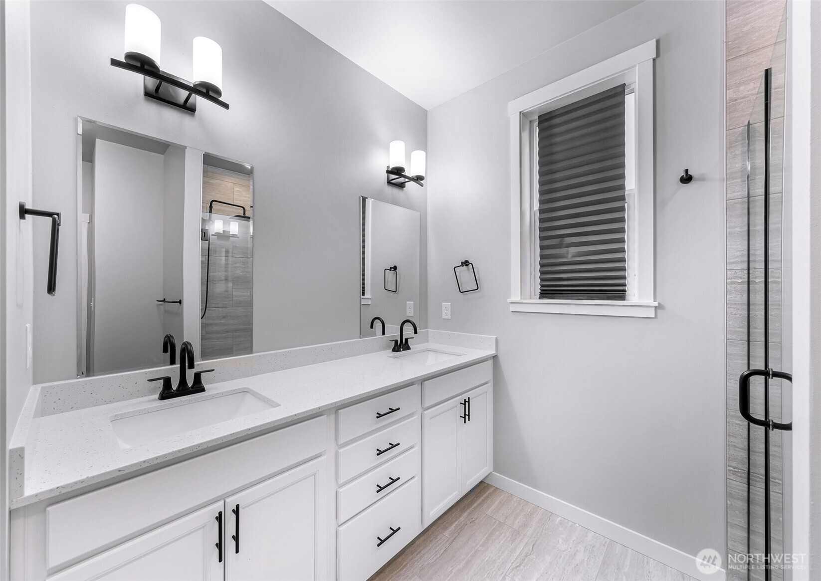 2058 Andre Court Ferndale, WA 98248 - Photo 9 of 39 a bathroom with a sink a light fixture and a mirror