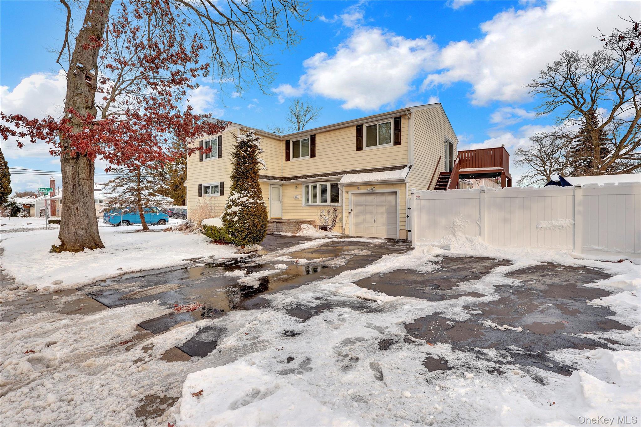 199 August Road North Babylon, NY 11703 - Photo 2 of 32 Traditional home featuring a garage