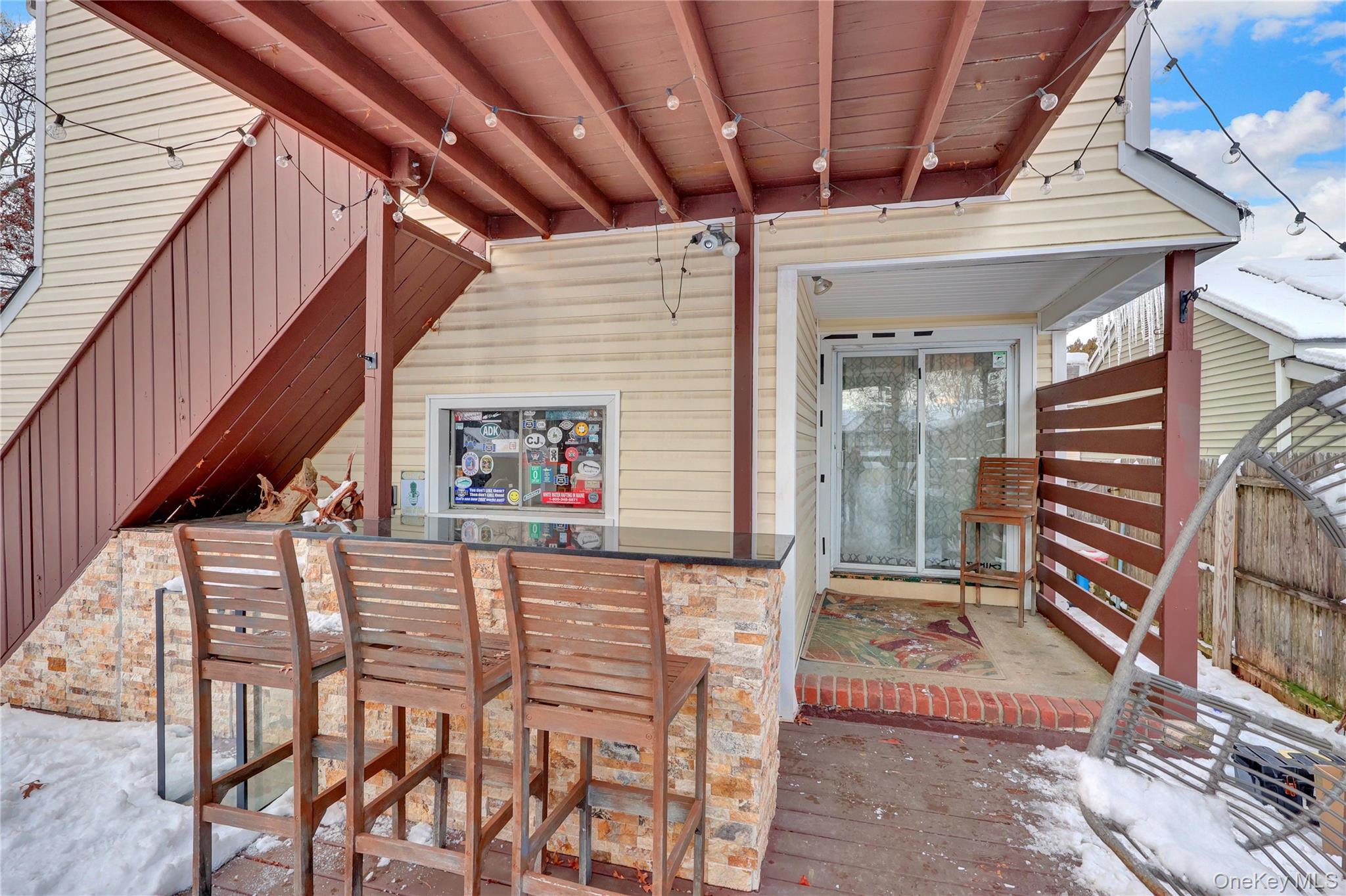 199 August Road North Babylon, NY 11703 - Photo 30 of 32 View of back patio bar with a wooden deck
