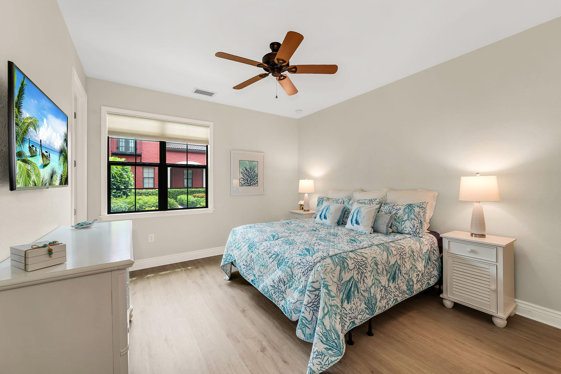 9066 Albion Lane North, Unit 5101 Naples, FL 34113 - Photo 26 of 48 a bedroom with a bed and a window