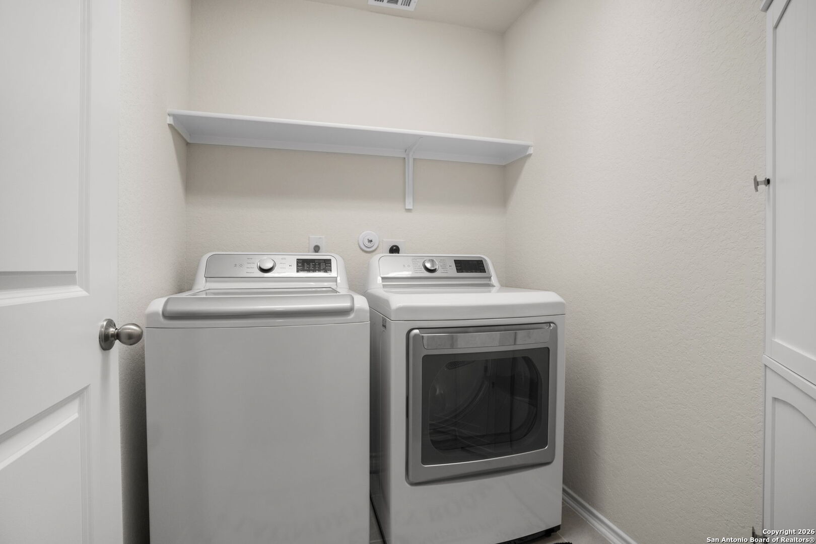 3658 Copper Willow Bulverde, TX 78163 - Photo 13 of 27 a utility room with dryer and washer