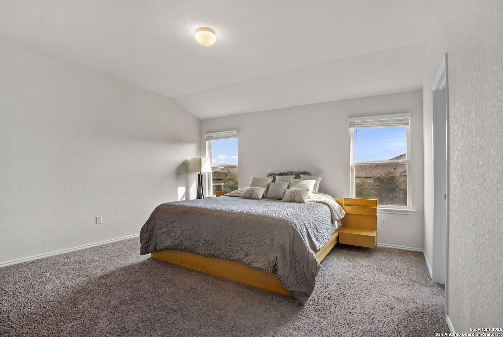 3658 Copper Willow Bulverde, TX 78163 - Photo 17 of 27 a bedroom with a bed and a window