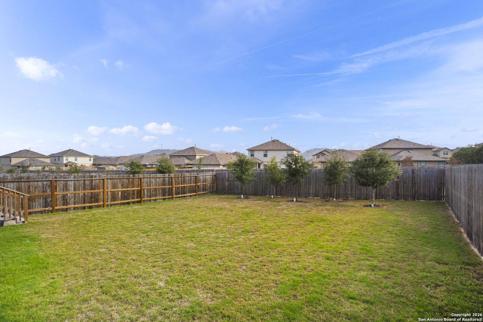 3658 Copper Willow Bulverde, TX 78163 - Photo 25 of 27 a view of a city with tall buildings in the background
