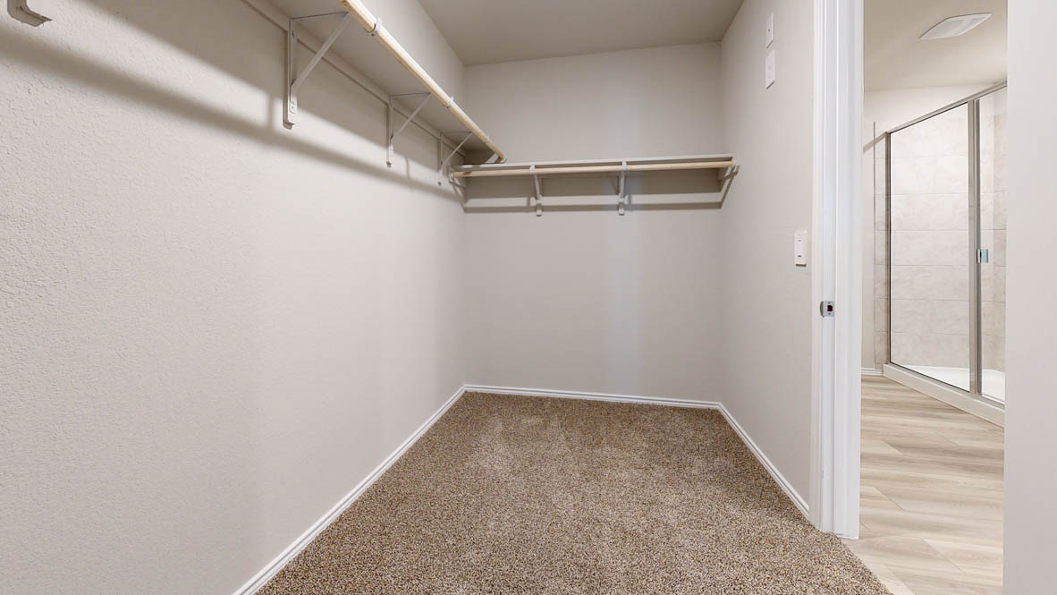 175 Rearden Boulevard Jarrell, TX 76537 - Photo 18 of 29 a view of a room with racks on the wall