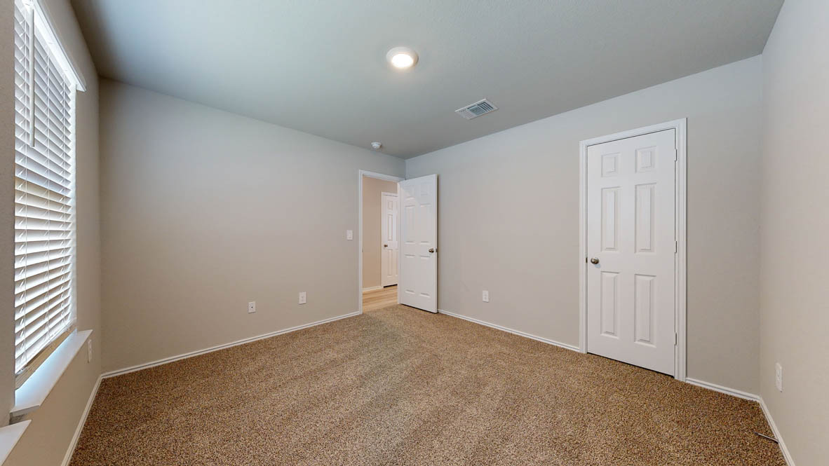 175 Rearden Boulevard Jarrell, TX 76537 - Photo 20 of 29 an empty room with windows and closet