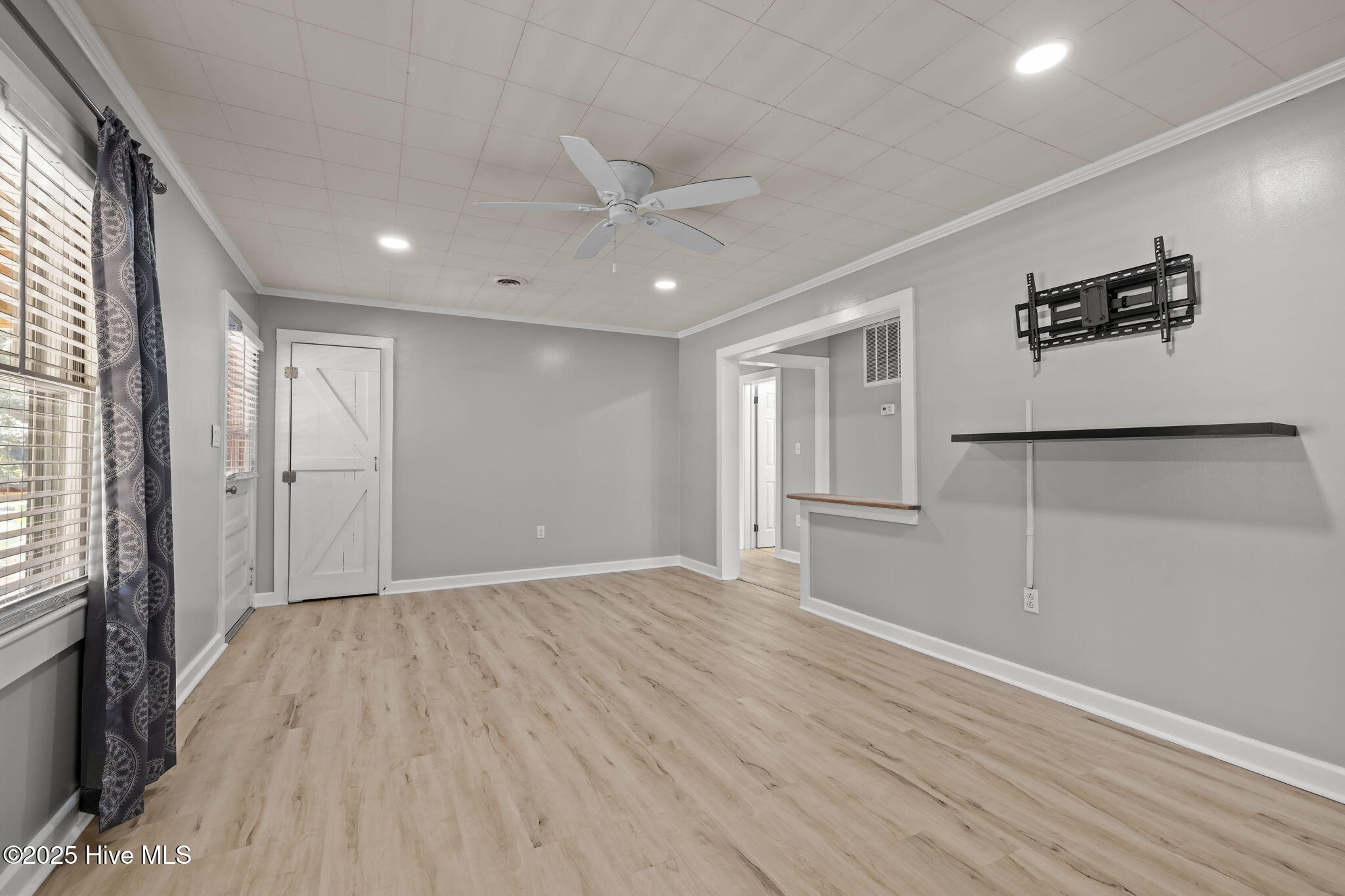 376 Shell Road Atlantic, NC 28511 - Photo 16 of 49 Living Room - dining room and huge screen porch, both are accessed from this room.