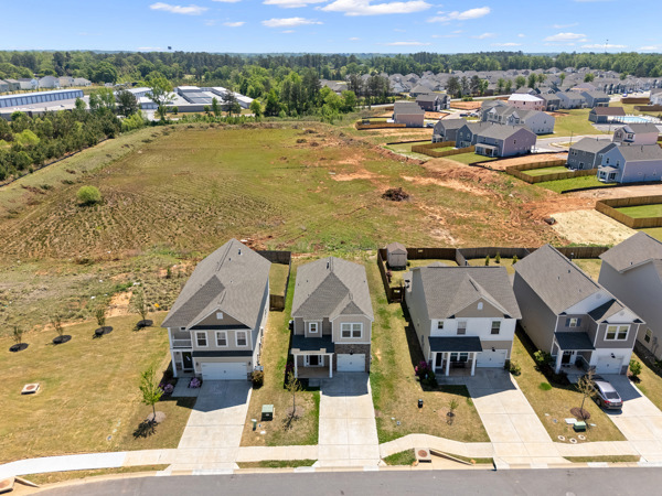 249 Samuel Street Pendleton, SC 29670 - Photo 27 of 33 This elevated view captures this home as well as other newly constructed residences nestled in a developing community.