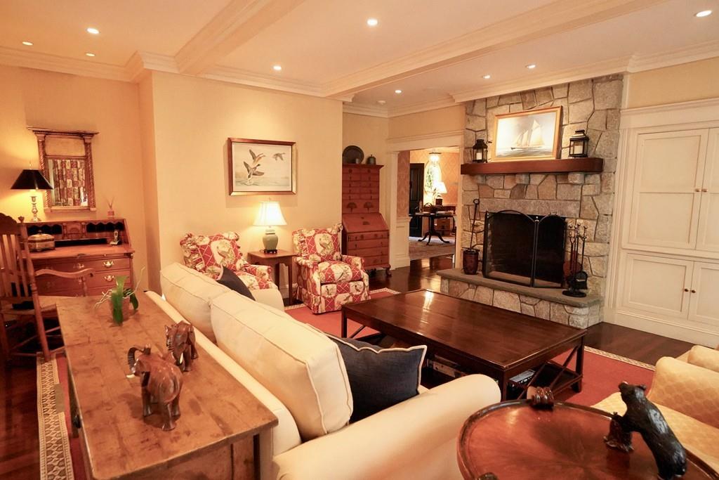 166 Atlantic Avenue Marblehead, MA 01945 - Photo 14 of 36 a living room with furniture and fireplace