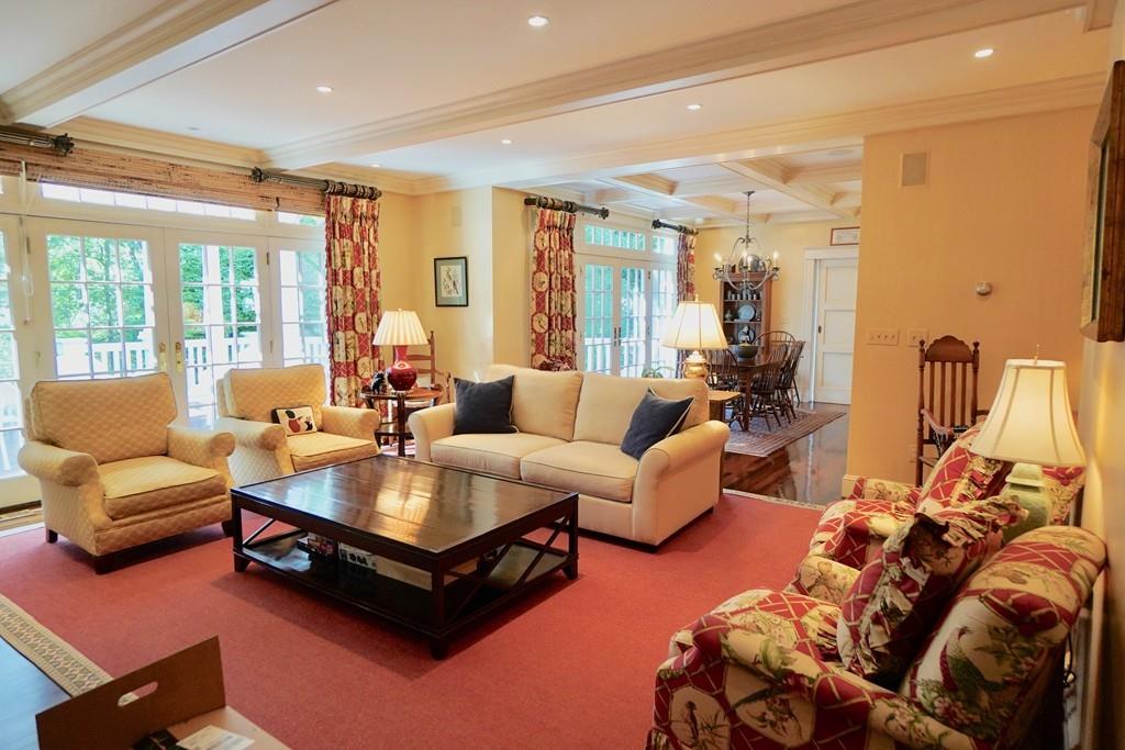 166 Atlantic Avenue Marblehead, MA 01945 - Photo 15 of 36 a living room with furniture and a large window