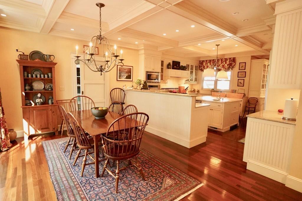 166 Atlantic Avenue Marblehead, MA 01945 - Photo 16 of 36 a view of a dining room with furniture and wooden floor