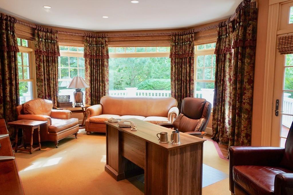 166 Atlantic Avenue Marblehead, MA 01945 - Photo 17 of 36 a living room with furniture and a large window