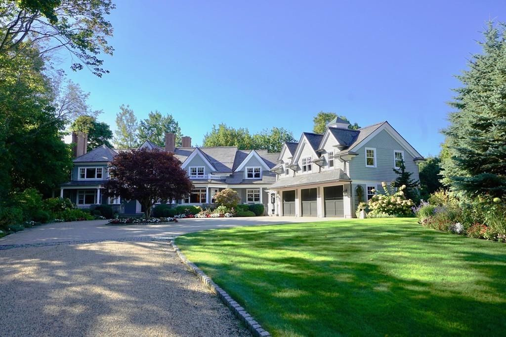 166 Atlantic Avenue Marblehead, MA 01945 - Photo 2 of 36 a front view of a house with a yard