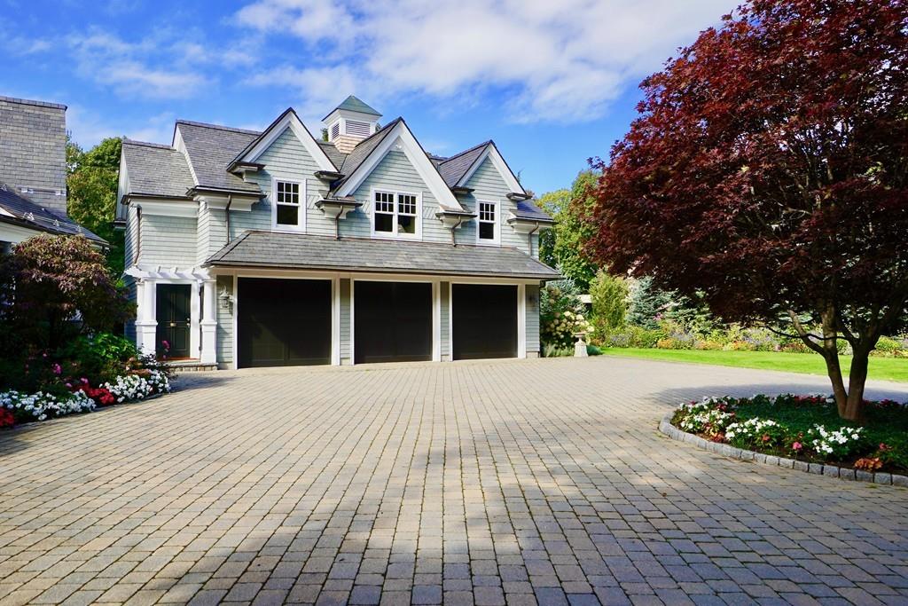 166 Atlantic Avenue Marblehead, MA 01945 - Photo 28 of 36 a front view of a house with a garden and yard