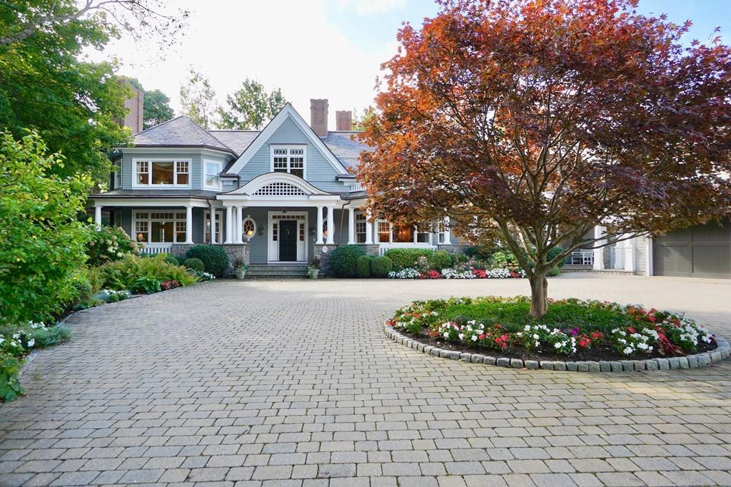 166 Atlantic Avenue Marblehead, MA 01945 - Photo 3 of 36 a front view of a house with a garden